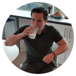 Man drinking a glass of milk