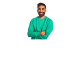 A smiling man with beard wearing a green jumper and folding his arms